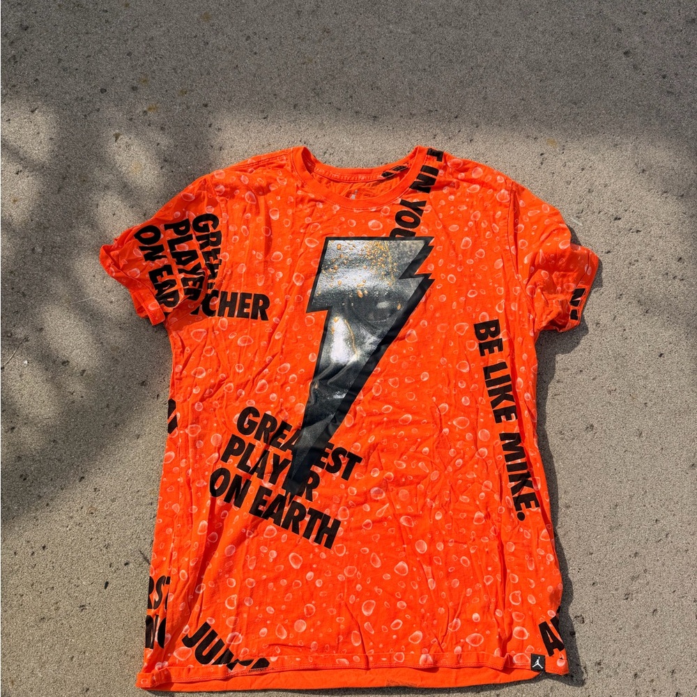 Jordan Orange Graphic Tee with Black Accents